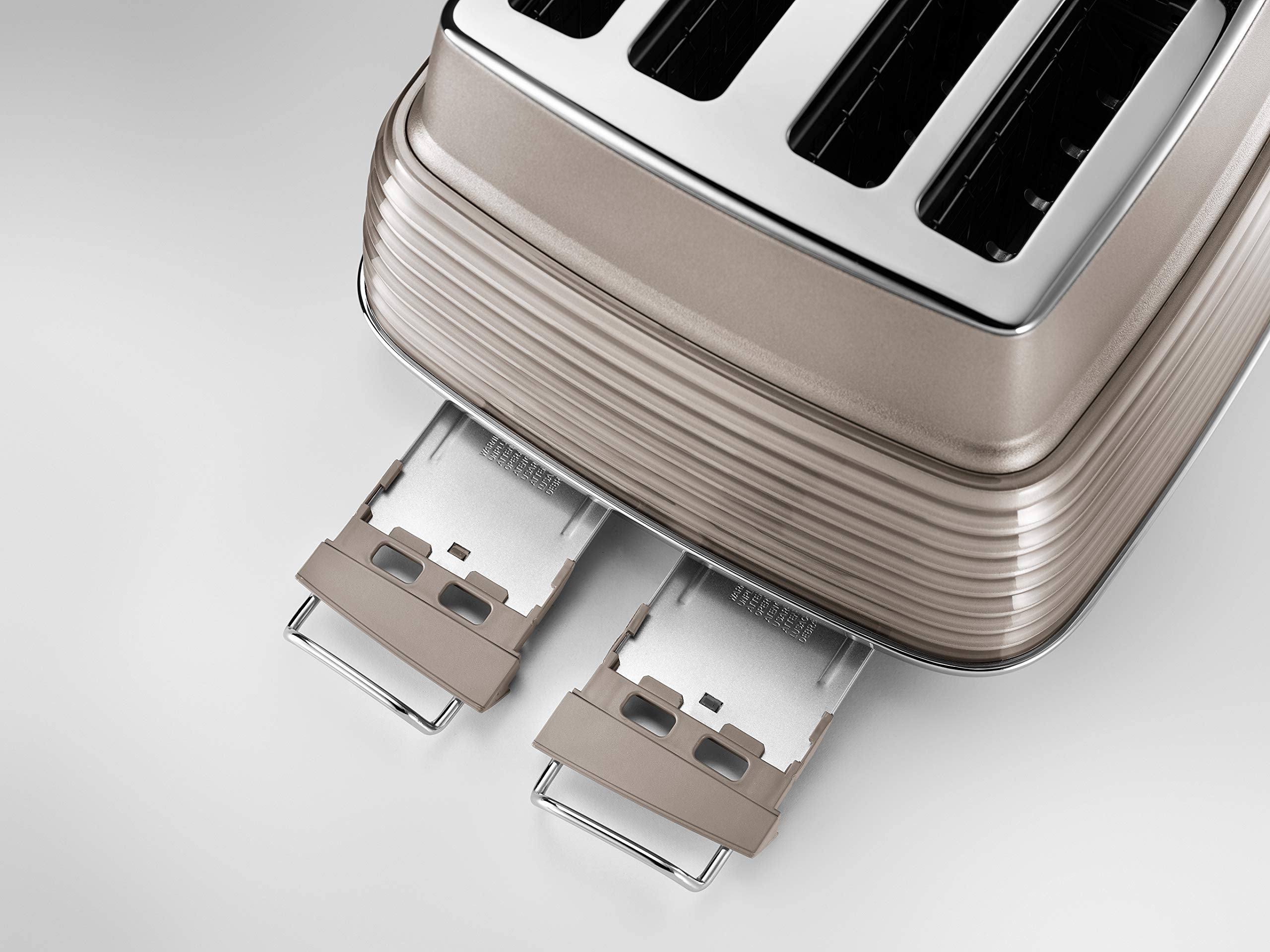 De'Longhi Scolpito 4 Slot Toaster, Reheat, Defrost, One-Side Bagel & 6 Browning Settings, Stainless Steel (without cartoon) محمصة خبز سكولبيتو من ديلونجي، من الستانلس ستيل وبـ 4 فتحات للتحميص واعادة التسخين De'Longhi Scolpito 4 Slot Toaster, Reheat, Defrost, One-Side Bagel & 6 Browning Settings, Stainless Steel (without cartoon) محمصة خبز سكولبيتو من ديلونجي، من الستانلس ستيل وبـ 4 فتحات للتحميص واعادة التسخين